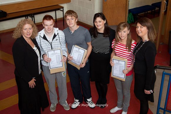 Desmond College Junior Certificate Students being congratulated by Principal and Deputy Principal