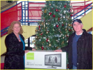 John McCoy winner of Television with Miss Gavin at Field Development Draw 2012