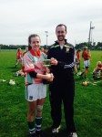 Desmond College being Awarded the trophy for Winning the Camogie Final 2014