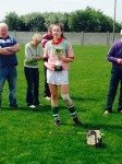 Desmond College being Awarded the trophy for Winning the Camogie Final 2014